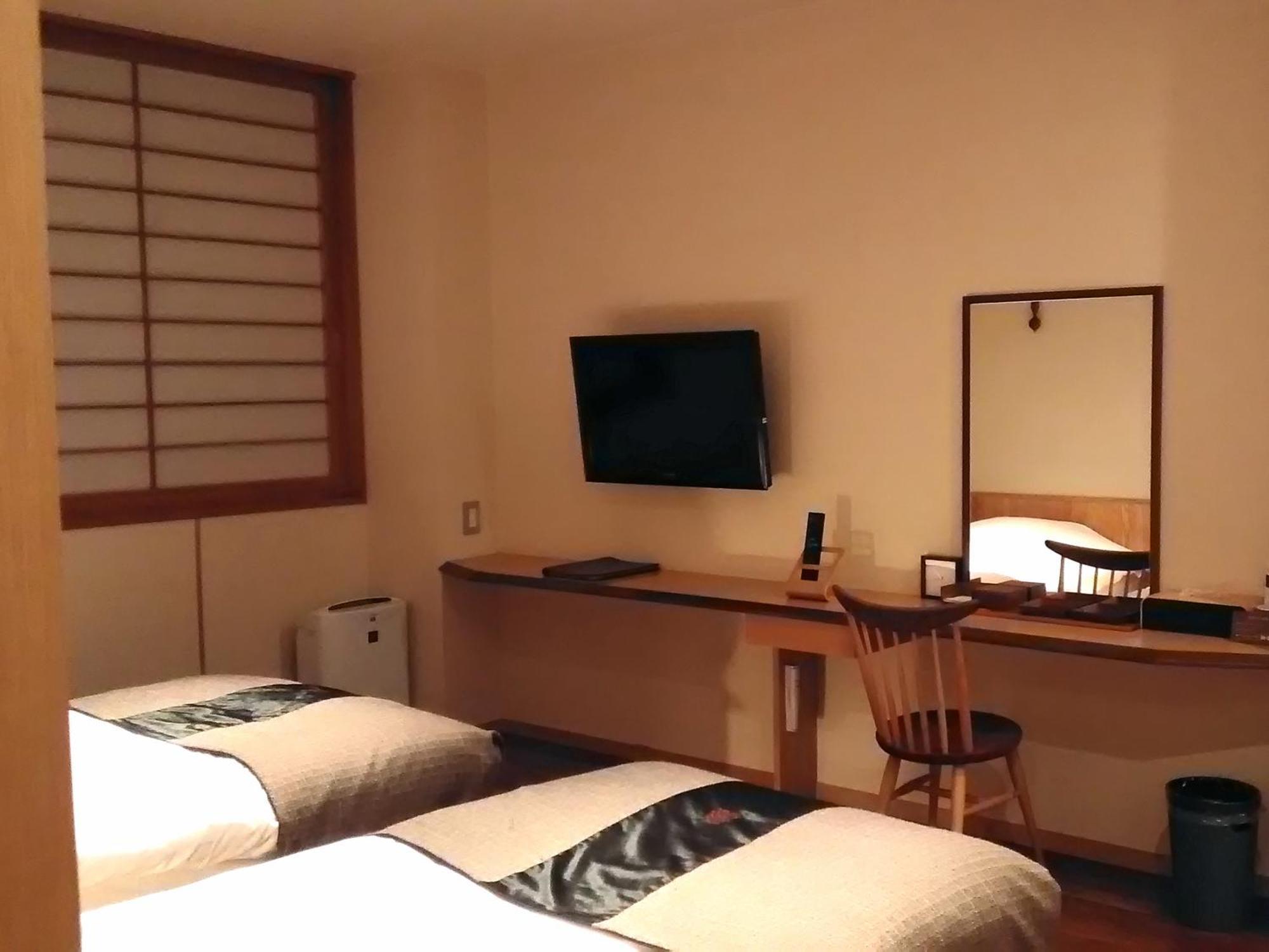 Hotel Niseko Konbu Onsen Tsuruga Moku-No-Sho Zimmer foto